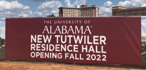 A sign that reads "The University of Alabama New Tutwiler Residence Hall Opening Fall 2022"
