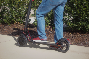 UA student on electric scooter