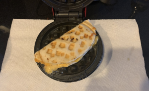 Cheese quesadilla on a waffle maker